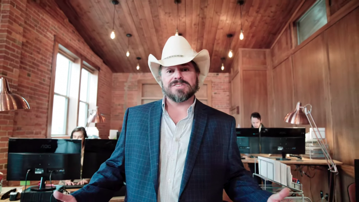 Image of Western man in office of Best Wyoming registered Agent